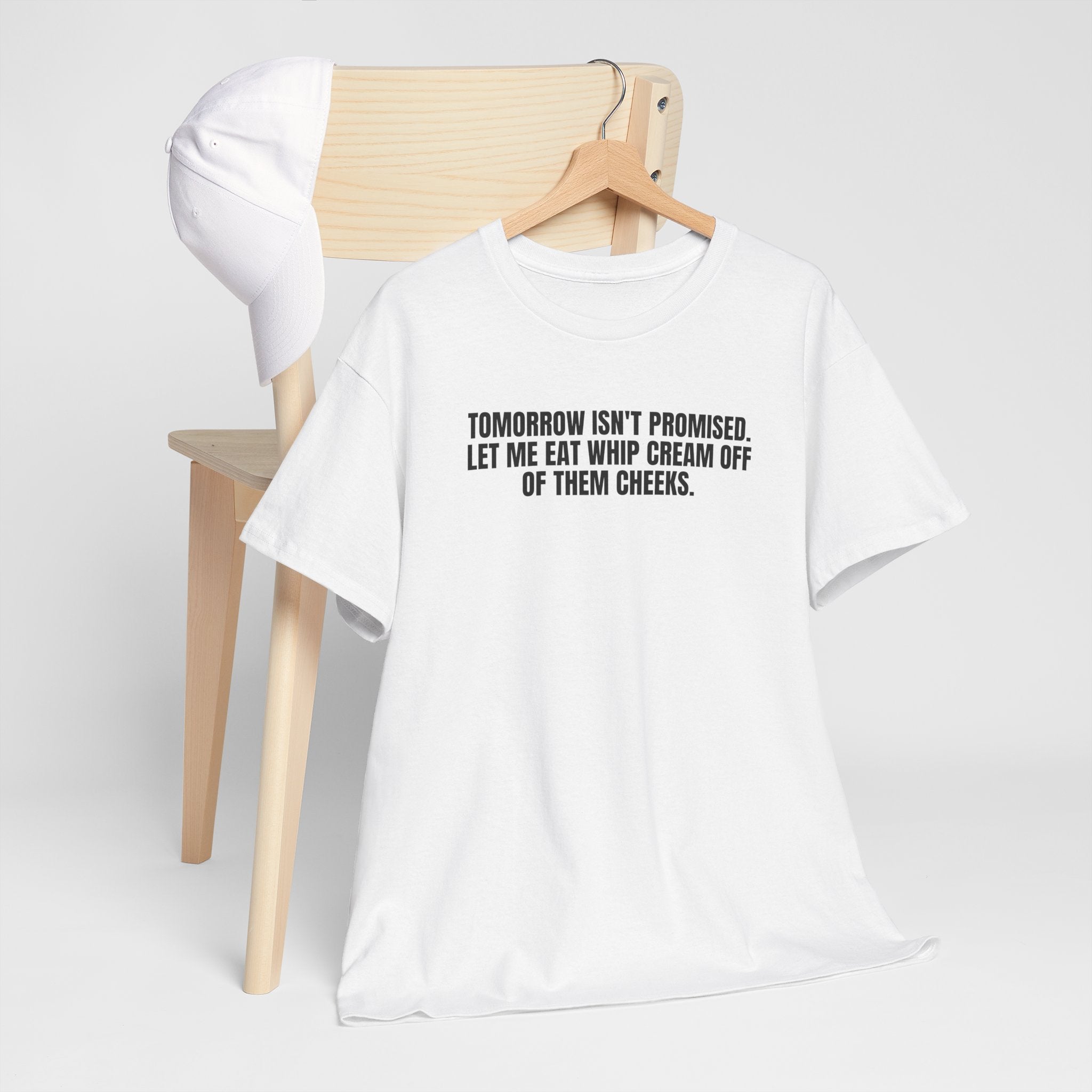 Black T-shirt featuring the phrase "Tomorrow really Isn’t Promised" by Printify, displayed flat on a white background.