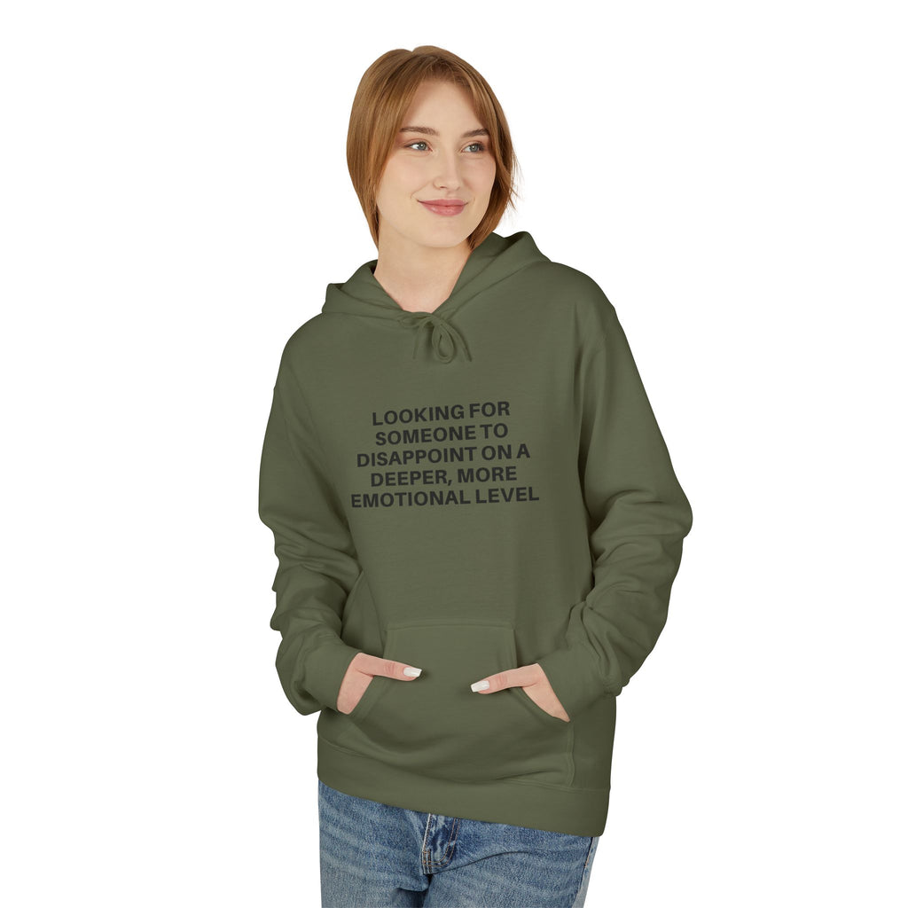 Black Deeper Level Hoodie by Printify, featuring a cozy fit and front pocket, displayed on a wooden background.