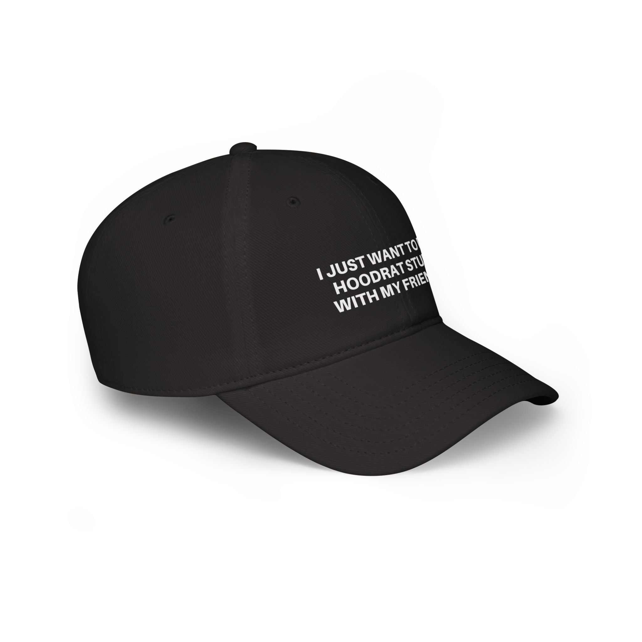 Black low profile baseball cap with embroidered white text and adjustable Velcro closure