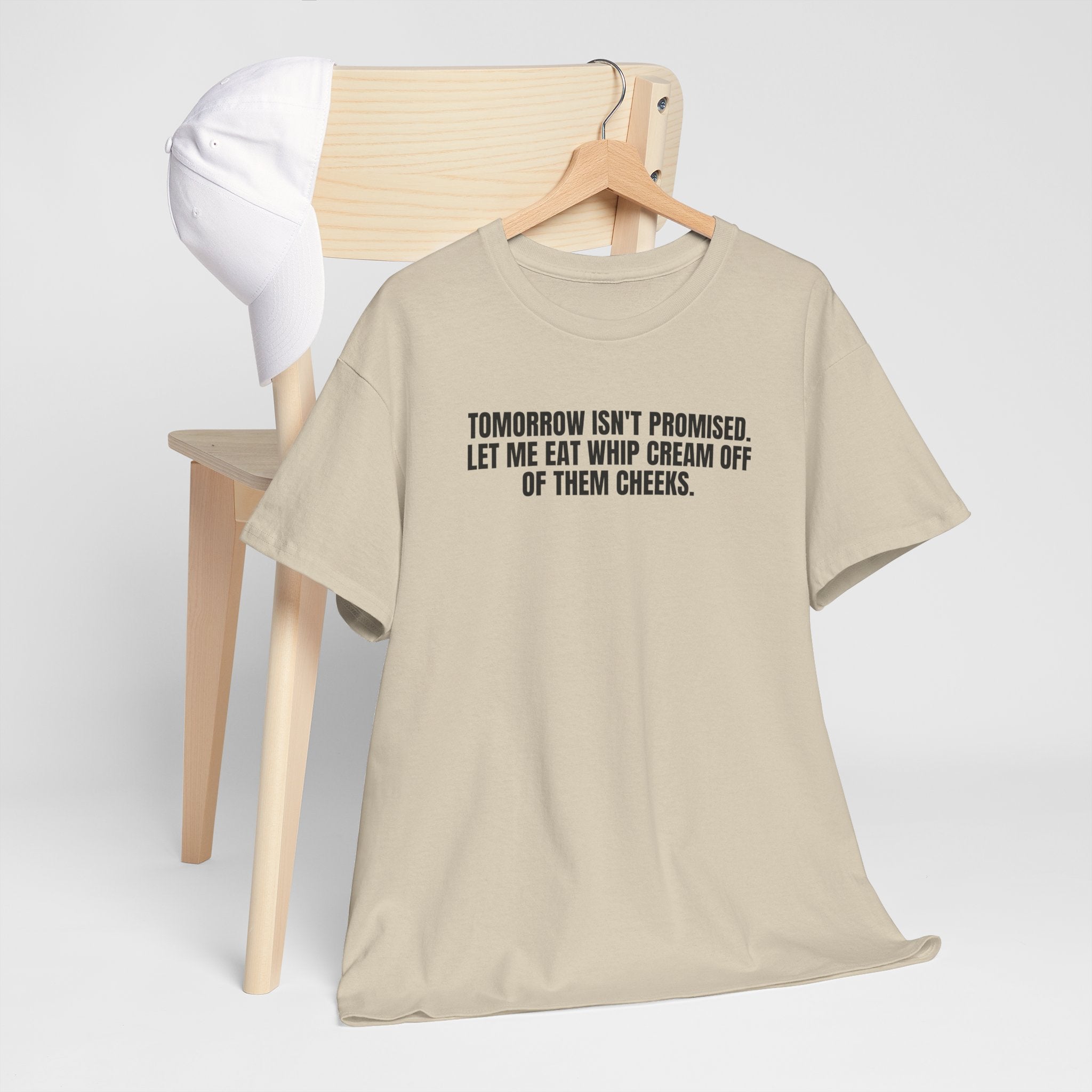 Black T-shirt by Printify featuring the phrase "Tomorrow really Isn’t Promised" in bold white lettering.
