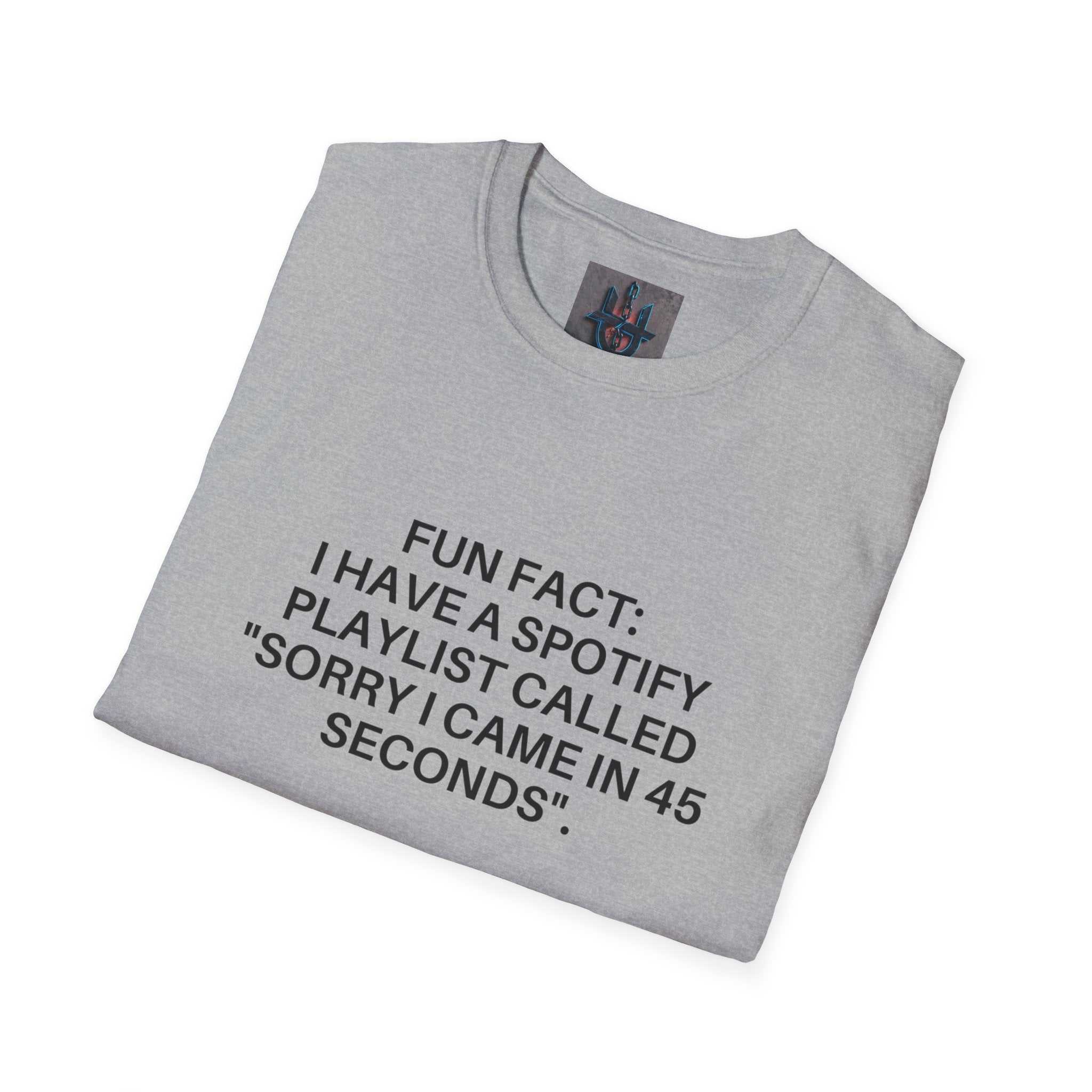 Folded light grey crew-neck tee with black humorous Spotify playlist text printed on front