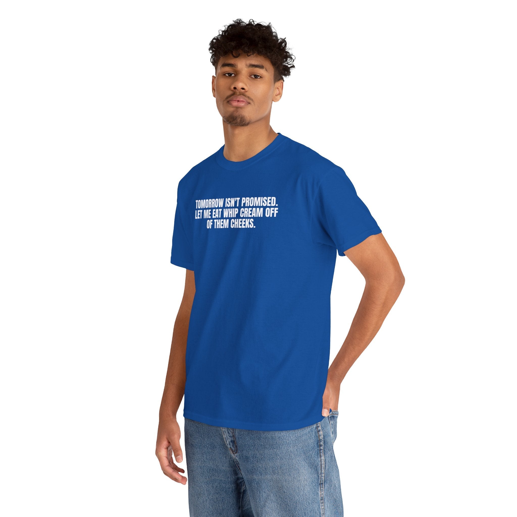 Lightweight everyday blue tee with cheeky white text "Tomorrow isn't promised" on chest modeled by man in jeans
