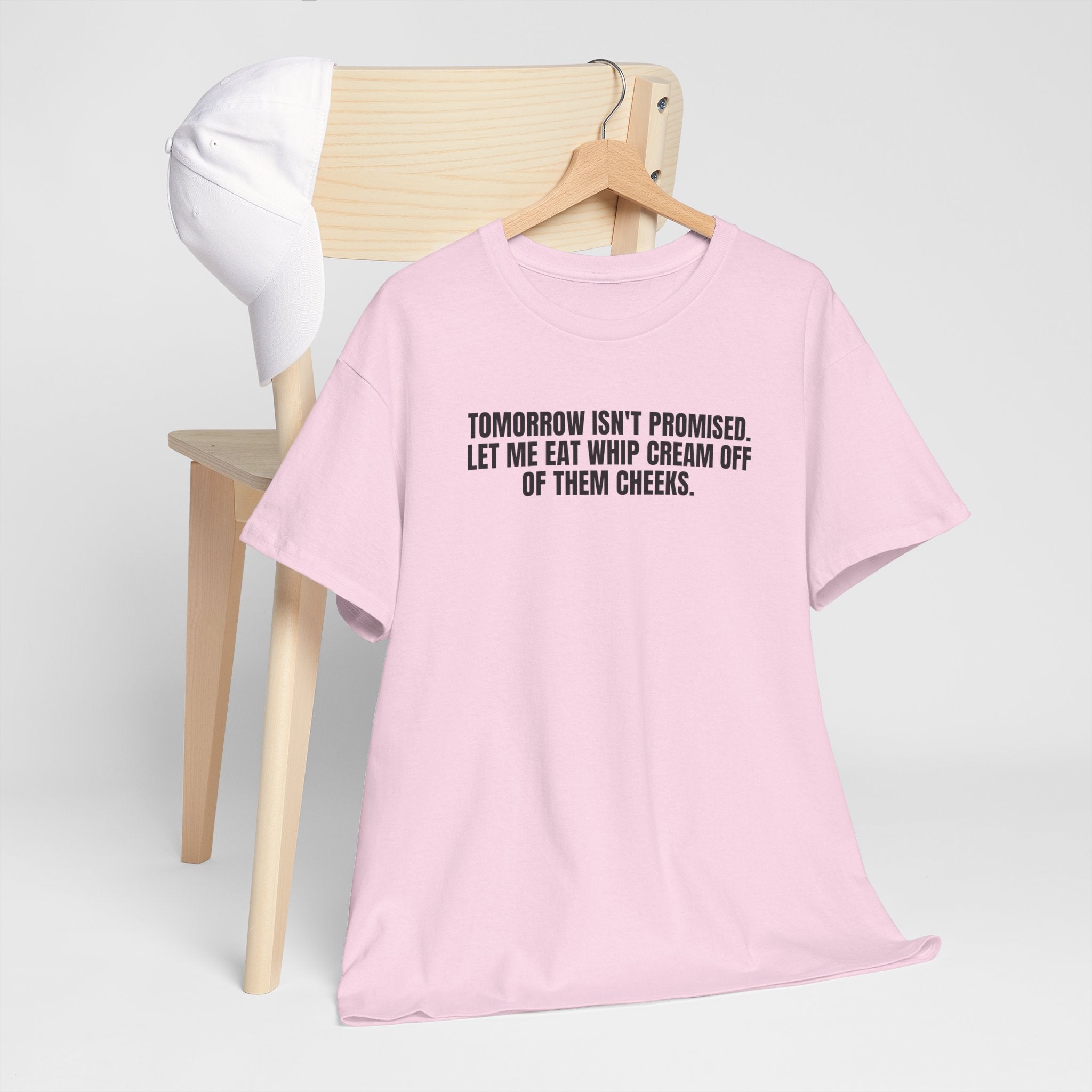 Black T-shirt by Printify featuring the phrase "Tomorrow Really Isn’t Promised" in stylish typography.