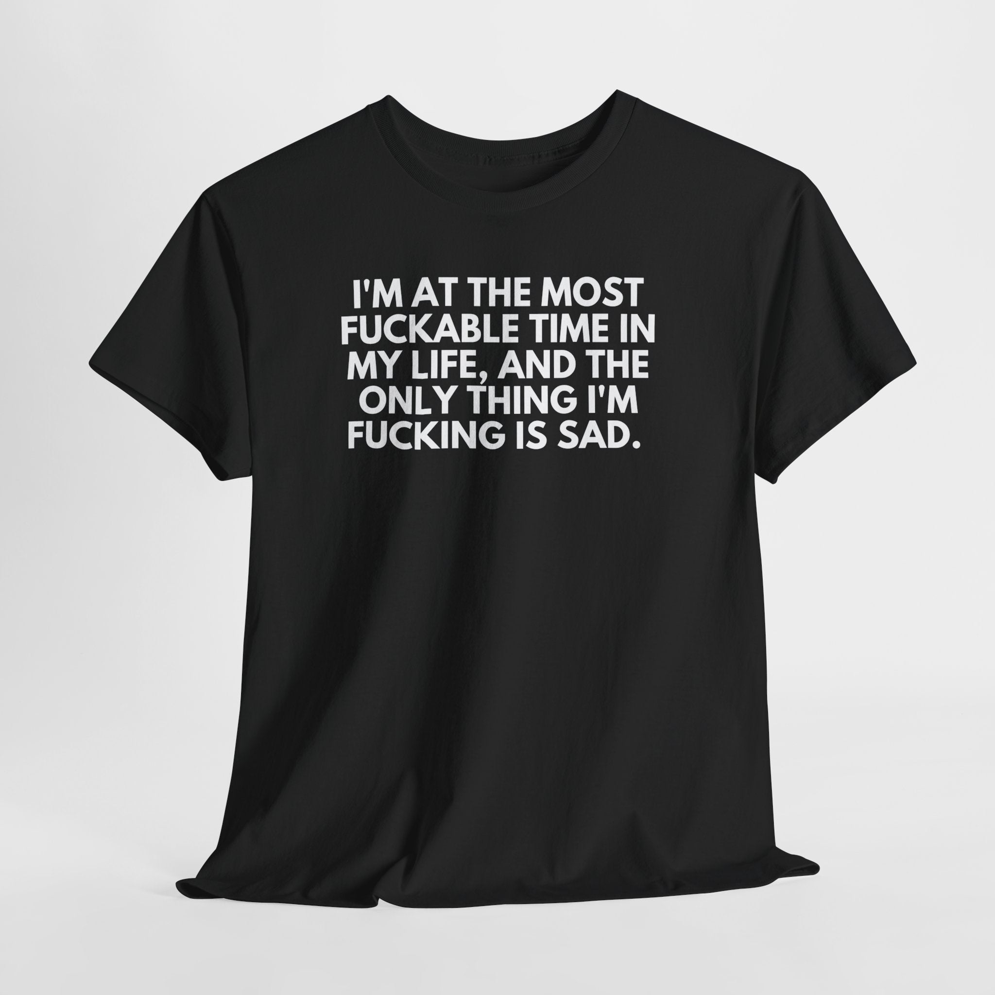 Black "Fucking Sad" t-shirt with bold white text statement on front, classic fit, crew neck design.