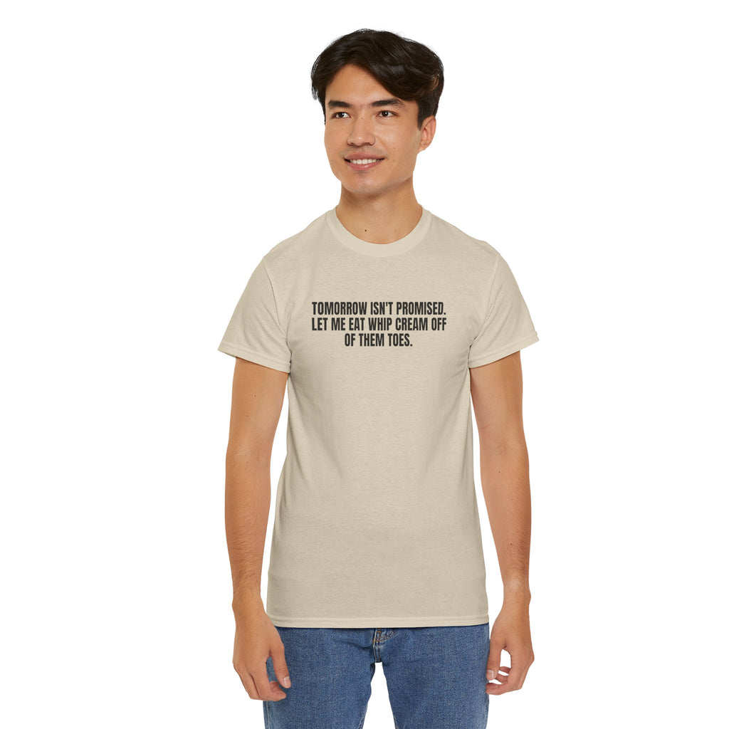 Black T-shirt featuring the phrase "Tomorrow Still Isn't Promised" by Printify, displayed on a neutral background.