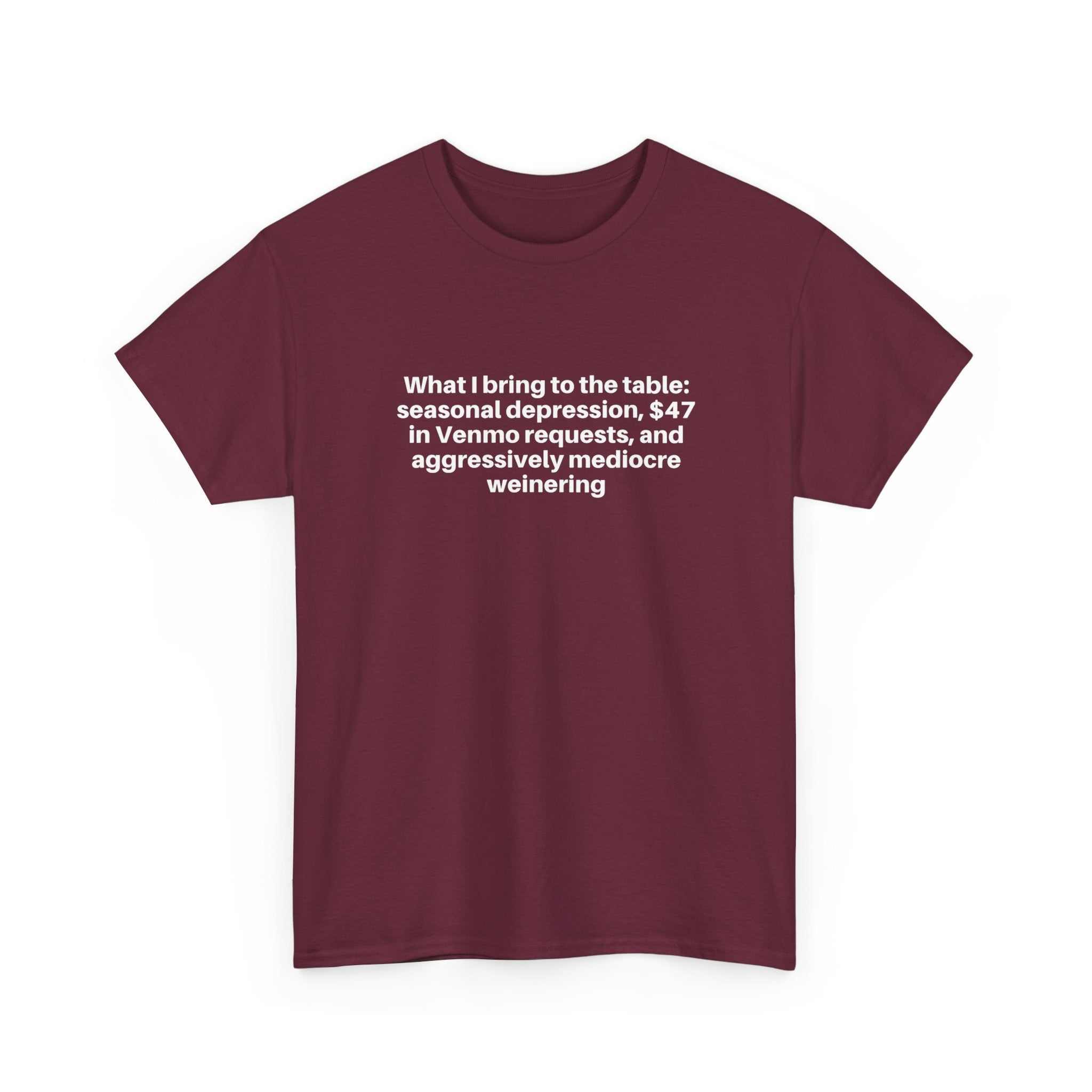 Maroon relaxed-fit cotton t-shirt with "What I bring to the table" humorous white text across the chest